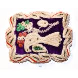 A large World War One pin cushion decorated with a 'Dove of Peace' hand made by grandmother,