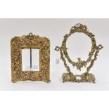 Late 19th early 20th century brass photograph frame with cherubs in relief,