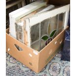 Two boxes of assorted early 20th Century and 1950s stained glass windows;