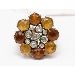 A diamond and citrine fancy cluster ring,