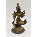 A gilt bronzed metal model of a Sino Tibetan Buddha, probably 19th Century,