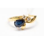 An eighteen carat gold and sapphire ring,