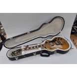 A Gibson Les Paul custom Classic Guitar, case and papers,