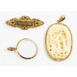 A carved ivory 9ct gold mount pendant approx 6 cm including bale,