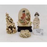 A carved ivory' Tree of Life', a domed ivory piece with carved lotus flowers,