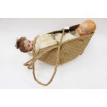 Two vintage dolls in basket (2)