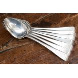 A matched set of seven George III Old English Pattern table spoons,