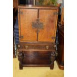 A Carolean style leather bound chest on stand