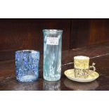 Two art glass vases; together with Staffordshire egg shell coffee can and saucer,