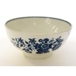 A Worcester blue and white bowl, circa 1770, floral transfer printed, crescent mark,