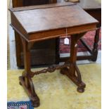 A mid 19th century pitch pine slope fronted desk,