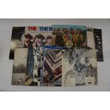 Lot of eleven records including 10 x Beatles LPs plus one x Rolling Stones 'Exile on Main Street',