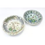 Two large Chinese famille rose shallow bowls, Birds and Prunus decoration on celadon ground.