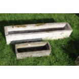 Two carved stone troughs, 20th Century,