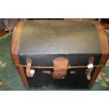 An early 20th Century black canvas and leather bound marriage trunk