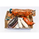 A collection of animal figures including Beswick fox, duck, tiger, two white pigs - ch wall Queen 4.