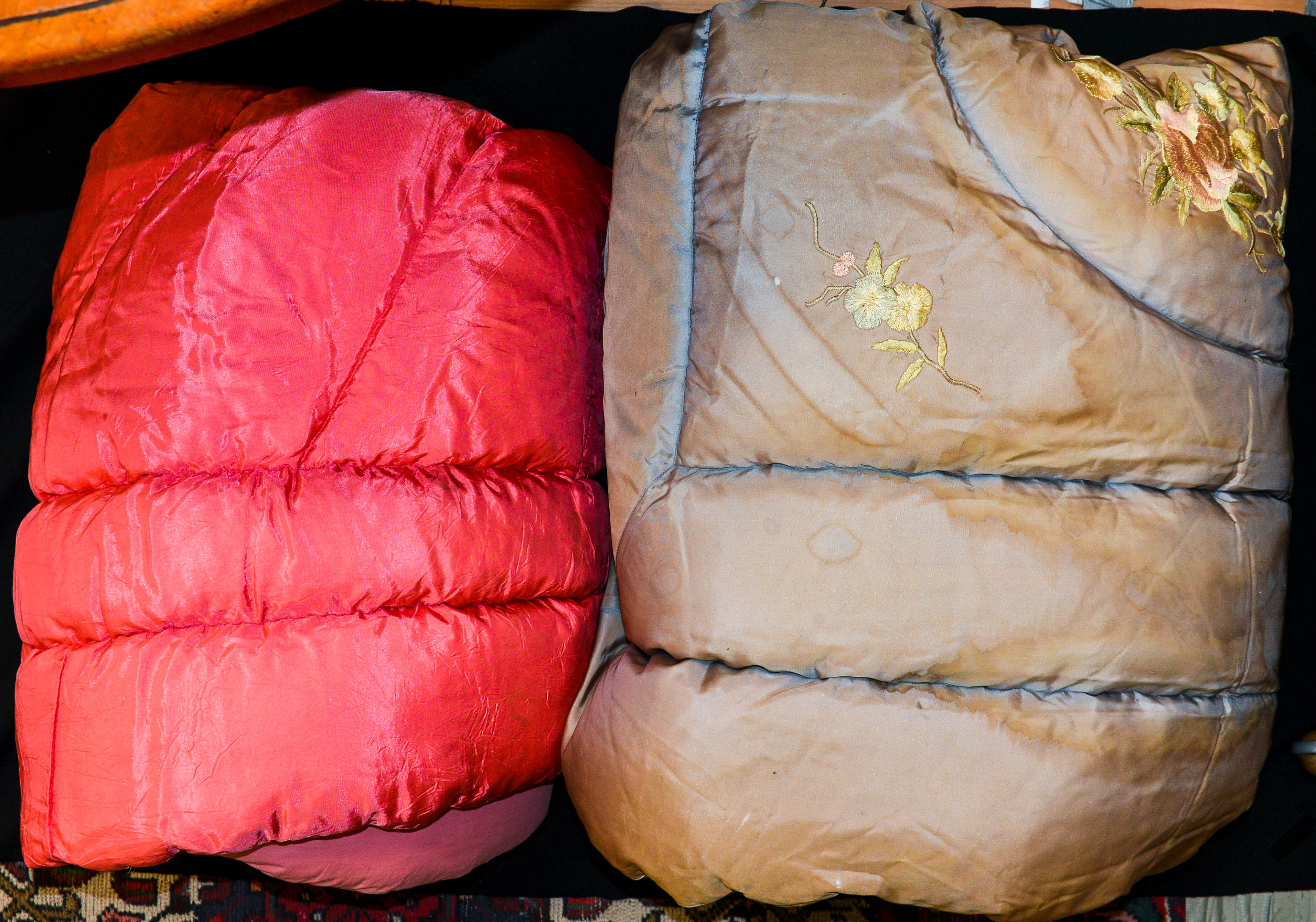 One good rose pink double quilt (one side in taffeta) and the other in cotton,