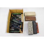 A large collection of vintage fountain pens including Parker, Waterman, Conway Dinkie,