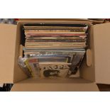 A collection of 30 LP records including Frnak Zappa and Captain Beetheart,