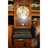 A National Time Recorder clocking in clock, London,