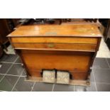 A mid Victorian mahogany cased Harmonium, with two pedals, five octaves,