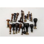 A collection of 19th Century treen handled desk wax seals,