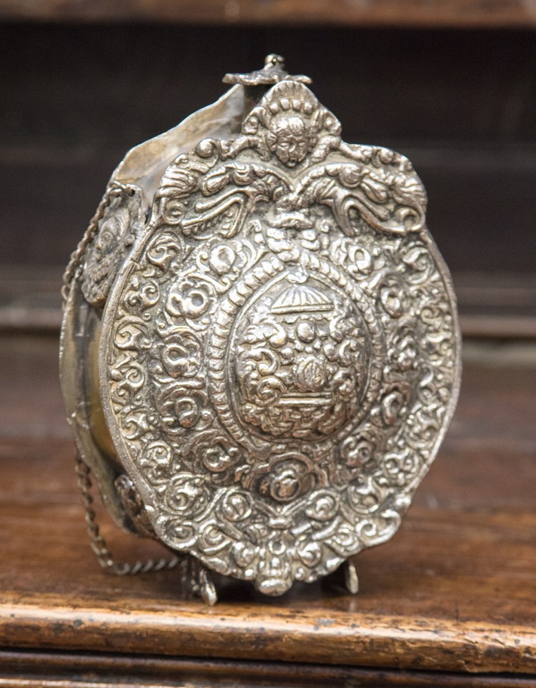 An 18th century silver plated gunpowder flask, possibly Russian.