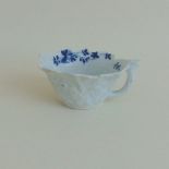 A small Worcester blue and white butter boat, circa 1758 workman's mark, 3.7 cm high approx, 8.