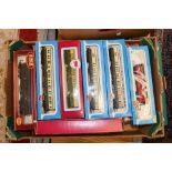 One box of assorted coaches, goods wagons and others to include: 11 Lima examples,