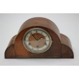 An Art Deco style cased wooden mantel clock