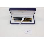 A cased set of Waterman of Paris pens to include a ball point pen and a fountain pen