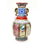 A Chinese Qianlong style vase polychrome decorated,