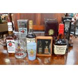Wild Turkey Bourbon Whisky, Jim Beam, Makers Mark, Jack Daniels; together with Bells water carafe,