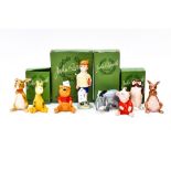 A group of Beswick Walt Disney Winnie the Poo figures, including; Tigger, Owl, Eyorr, Poo Bear,