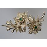 An emerald and diamond flower head brooch and earring set,