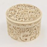 A heavily carved ivory powder bowl,