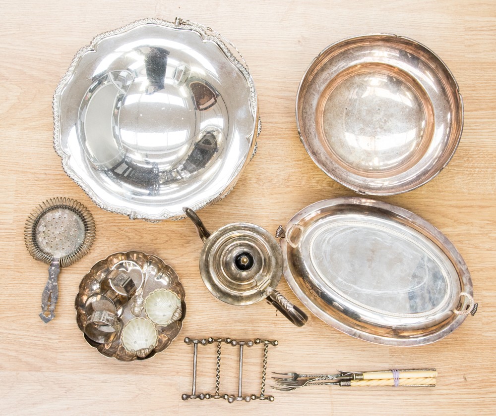 A box of assorted silver plate, including coffee pot, tureen, swing handle basket, dishes,