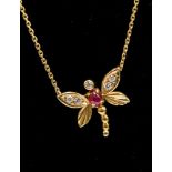 An 18ct ruby and diamond set Dragonfly pendant,