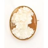 A Victorian oval shell cameo 9ct yellow gold brooch,