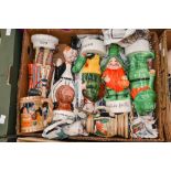 A collection of musical and figural bottles in the form of gnomes, clown,