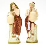 A pair of Royal Dux Arabian water or wine carriers, modelled as a man and woman, 1447,