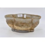 An oval soap stone style bowl,