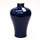 A Chinese monochrome blue vase, inverse baluster form, Qianlong mark,