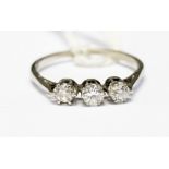 Three stone diamond ring