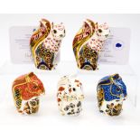 A group of five Royal Crown Derby Squirrels: two Welbeck Squirrels,