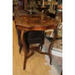 An Edwardian rosewood two-tier occasional table,