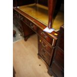 Mahogany pedestal desk with inset leather top