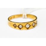 A Victorian 18ct gold five seed pearl set band ring,