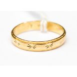 An eighteen carat gold wedding band, approx ring size 'R', approx weight 2.