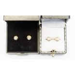 A pair of diamond 18ct yellow gold collet set stud earrings, round brilliant cut diamonds,